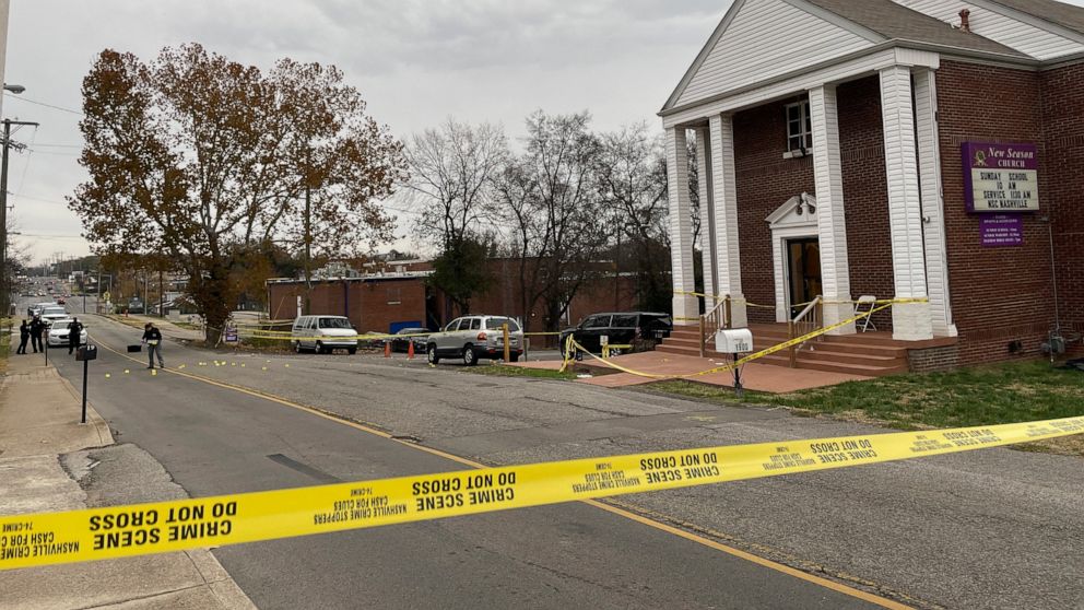 A crime scene is taped off at New Season Church in Nashville, Tenn., on Saturday, Nov. 26, 2022. Metro Nashville Police say two people suffered injuries that are not considered life-threatening in a drive-by shooting Saturday outside the church as pe