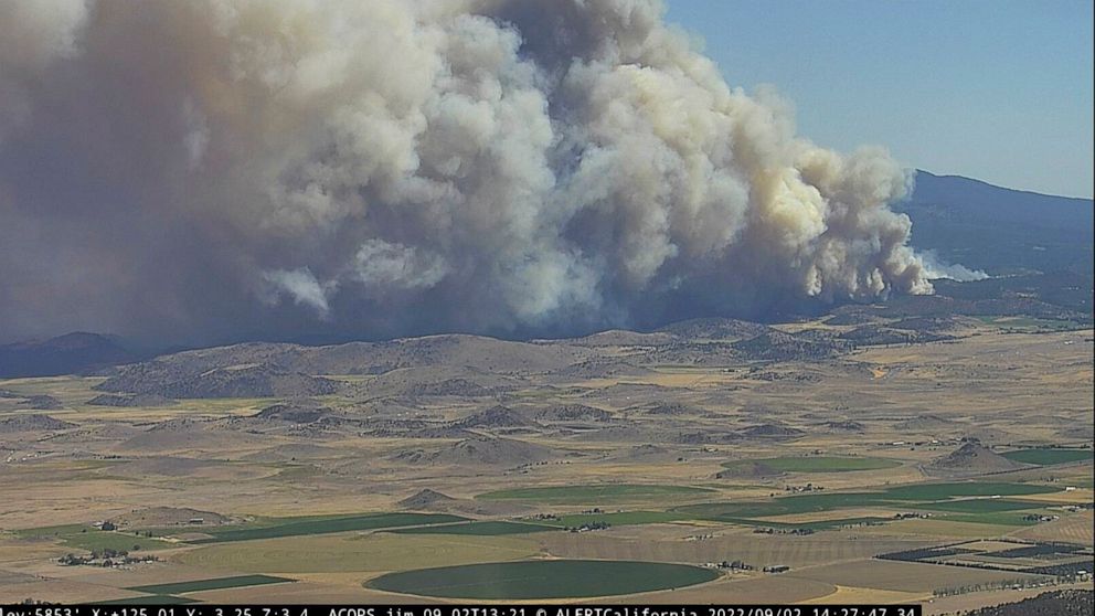 In this image from a Cal Fire monitoring camera on Antelope Mountain, the Mill Fire burns near Weed, Calif., Friday Sept. 2, 2022. (Cal Fire/ALERTWildfire Network via AP)
