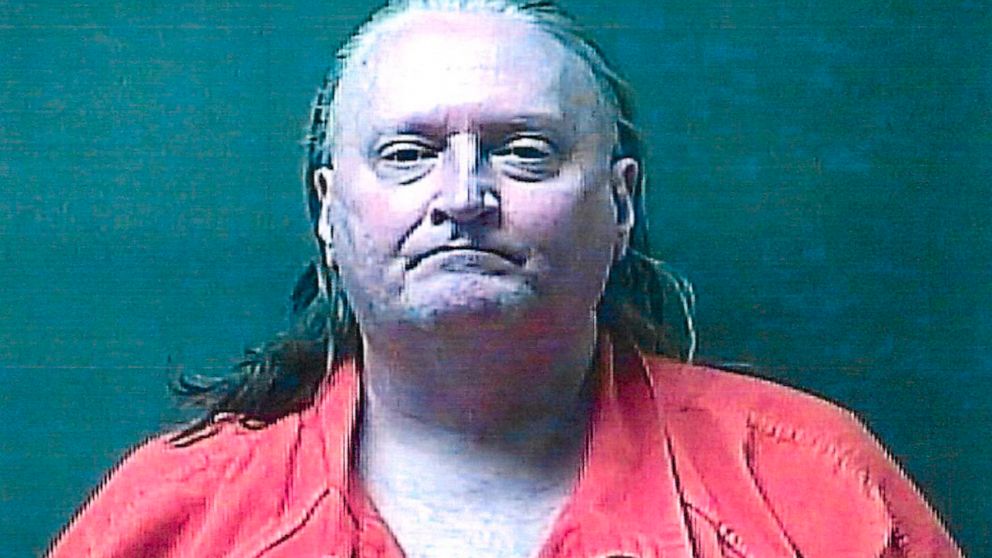 This booking photo provided by the LaPorte County Sheriff’s Office shows Thomas Holifield, 59, who is charged with murder in the June 1, 2021, methanol poisoning death of 64-year-old Pamela Keltz, according to Michigan City, Ind., police and the LaPo