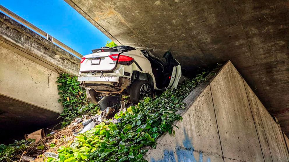  Man fleeing police crashes, wedges Maserati under freeway