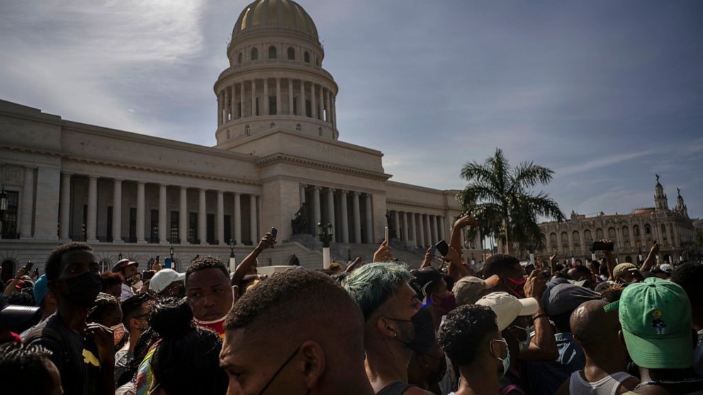 FILE - In this July 11, 2021 file photo, people protest in front of the Capitol in Havana, Cuba. A report released Wednesday, July 21, shows philanthropic funding to promote global human rights reached a record $3.7 billion in 2018. The report by the