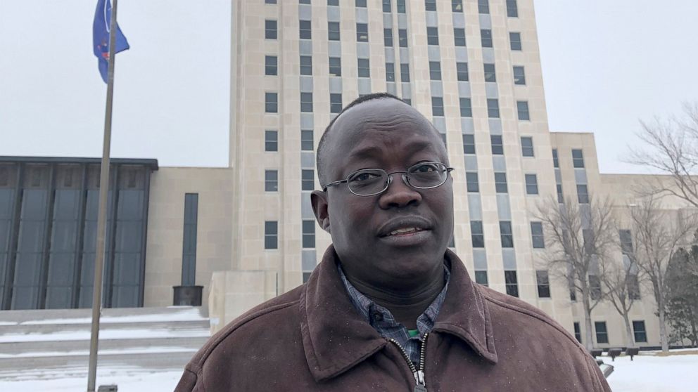 Reuben Panchol is shown Friday, Dec. 6, 2019 at the North Dakota state capitol in Bismarck. Panchol, who immigrated from Sudan to North Dakota as a child, says he hopes to tell his personal story at a meeting Monday, Dec. 9 at which the Burleigh Coun