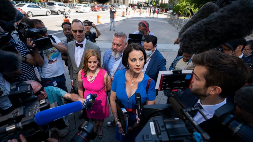 Sarah Ransome, an alleged victim of Jeffrey Epstein and Ghislaine Maxwell, right, alongside Elizabeth Stein, left, speak to members of the media outside federal court, Tuesday, June 28, 2022, in New York. Ghislaine Maxwell, the jet-setting socialite 