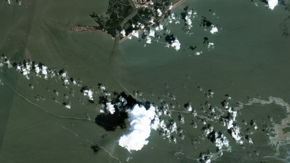 In a satellite image provided by Maxar Technologies, an oil slick is shown on Sept. 2, 2021 south of Port Fourchon, La. The U.S. Coast Guard said Saturday, Sept. 4, that cleanup crews are responding to a sizable oil spill in the Gulf of Mexico follow