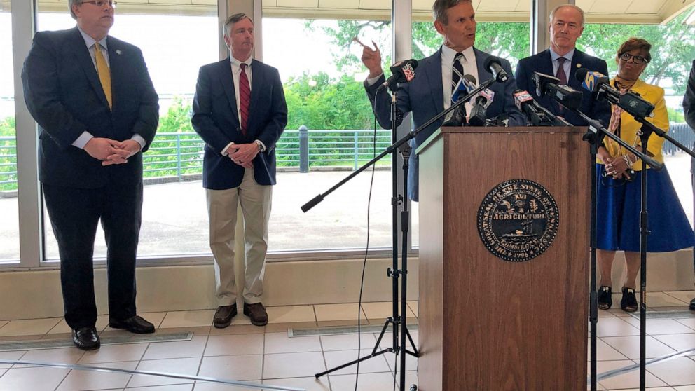 Tennessee Gov. Bill Lee speaks with reporters about the closure of the Interstate 40 bridge connecting his state with Arkansas, Tuesday, May 18, 2021, in Memphis, Tenn. Lee also was joined at the news conference by, from left, Memphis Mayor Jim Stric