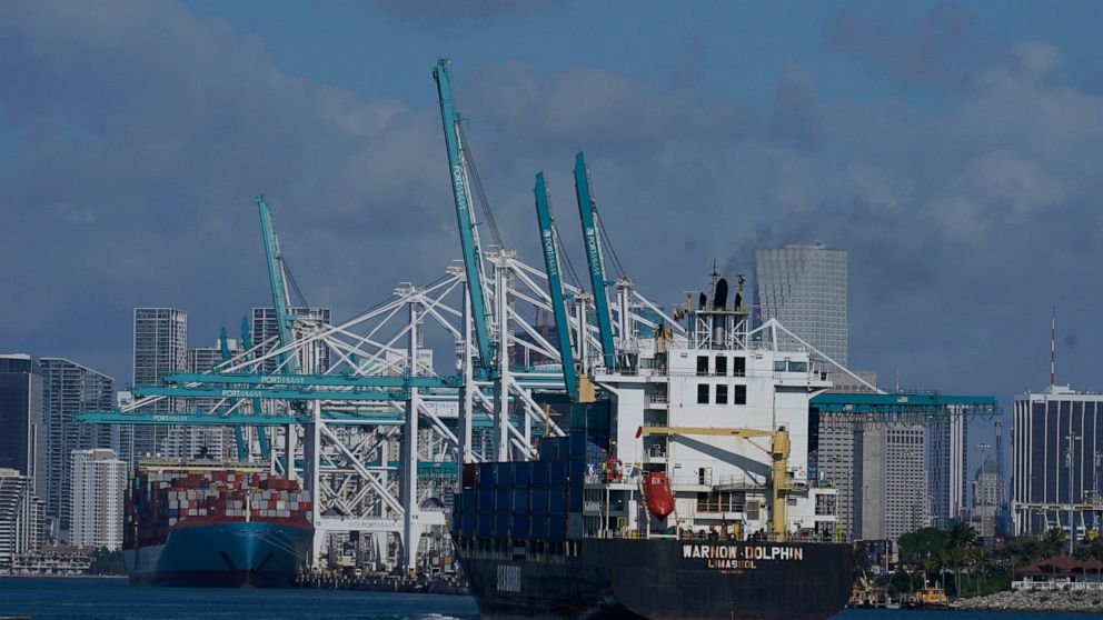 In this April 29, 2021 photo, The Warnow-Dolphin container ship enters PortMiami, in Miami Beach, Fla. Importers are contending with a perfect storm of supply trouble — rising prices, overwhelmed ports, a shortage of ships, trains, trucks — that is e