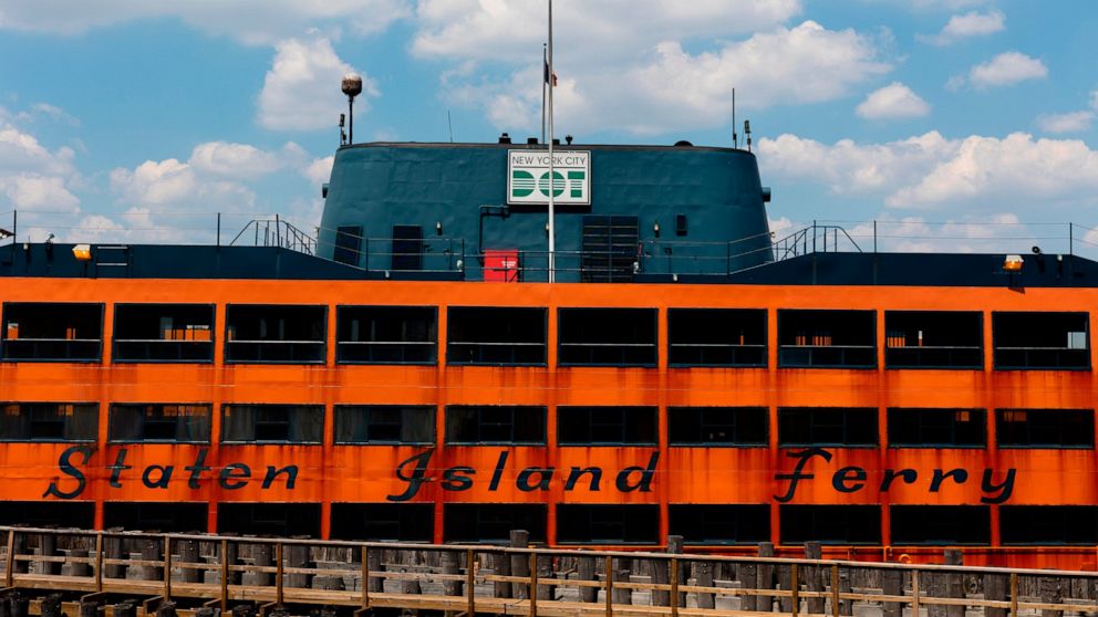 A Staten Island Ferry boat at the St. George Terminal, Thursday, Aug. 4, 2022, in the Staten Island borough of New York. (AP Photo/Julia Nikhinson)