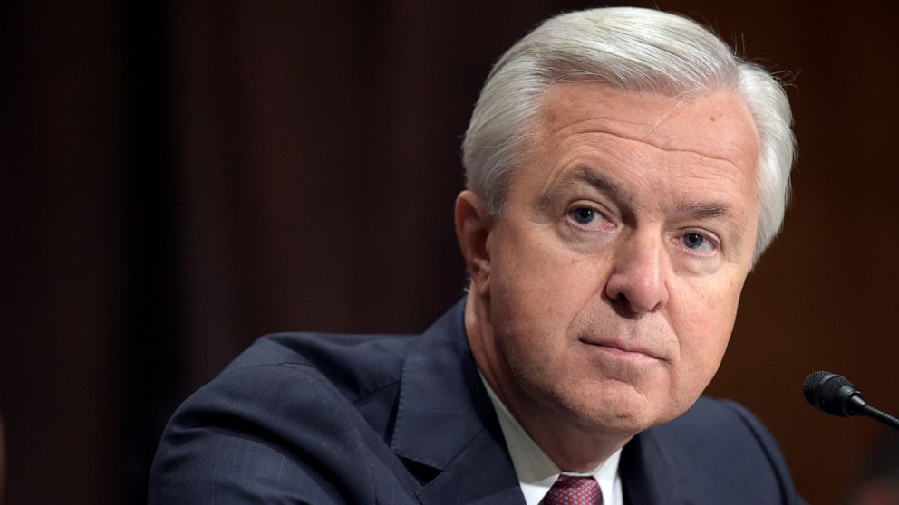FILE - In this Sept. 20, 2016, file photo, Wells Fargo CEO John Stumpf testifies on Capitol Hill in Washington, before the Senate Banking Committee. Federal regulators have slapped former Wells Fargo Chief Executive Stumpf with a $17.5 million fine f