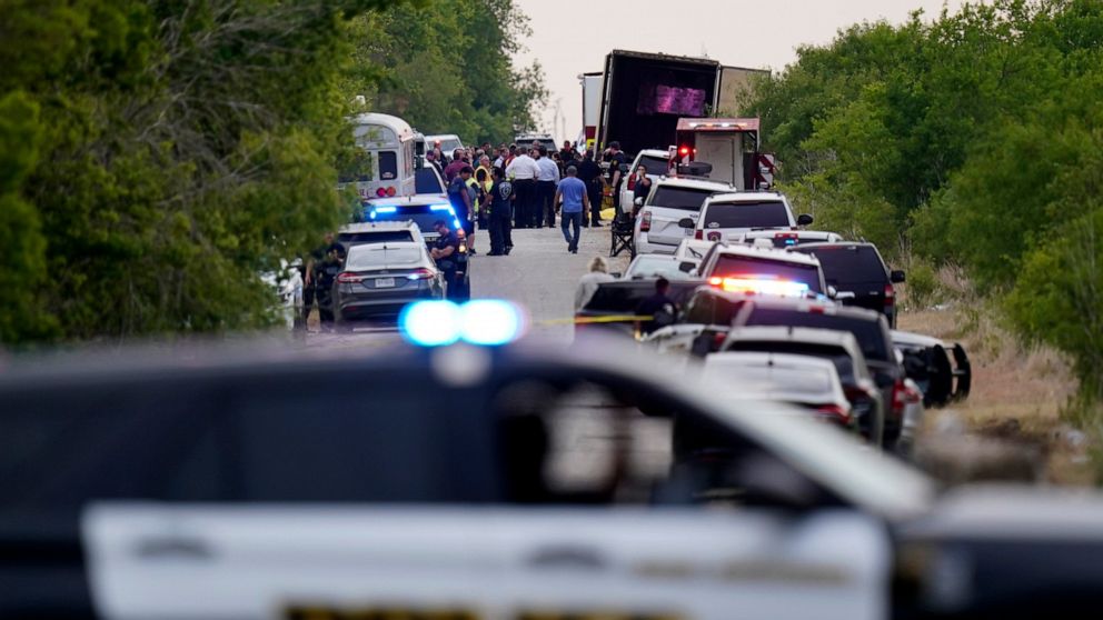 Police block the scene where a tractor trailer with multiple dead bodies was discovered, Monday, June 27, 2022, in San Antonio. (AP Photo/Eric Gay)