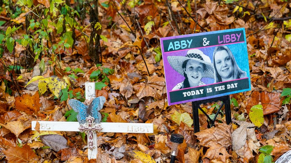 FILE - A makeshift memorial to Liberty German and Abigail Williams near where they were last seen and where the bodies were discovered stands along the Monon Trail leading to the Monon High Bridge Trail in Delphi, Ind., Oct. 31, 2022. An Indiana judg