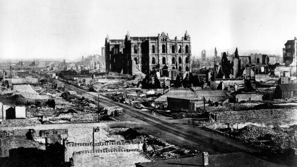 FILE - This general view shows the Chicago Court house and downtown area in the aftermath of the fire in Chicago, Ill., 1871. AP did not have photographers at the time of the Chicago fire but has since added photos like this one in the public domain 