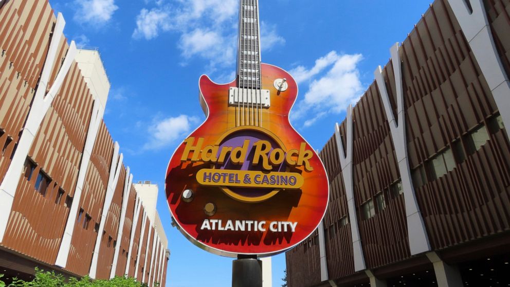 Clouds pass behind the guitar sculpture at the entrance to the Hard Rock casino in Atlantic City, N.J., on June 28, 2022. Hard Rock on Tuesday, Jan. 3, 2023, hired a new management team as the property pushes for an even greater share of the market. 