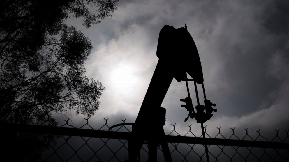 A pumpjack operates on Jan. 15, 2015, in Bakersfield, Calif. Residents of Bakersfield are concerned about potential explosions after a state agency found that six idle oil wells near homes were leaking methane in the past several days. (AP Photo/Jae 