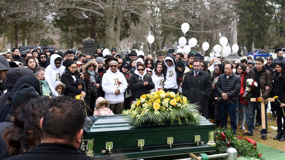 FILE — In this Feb. 13, 2019 file photo, friends and family of homicide victim Valerie Reyes attend her burial at Greenwood Union Cemetery in Rye, N.Y. Javier Da Silva, who killed Valerie Reyes, whose body was found in a suitcase dumped in Connecticu