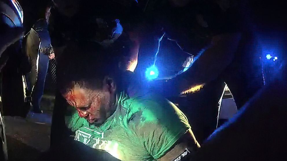 FILE - This image from video from Louisiana state police state trooper Dakota DeMoss' body-worn camera, shows troopers holding up Ronald Greene before paramedics arrived on May 10, 2019, outside of Monroe, La. Text messages obtained by The Associated