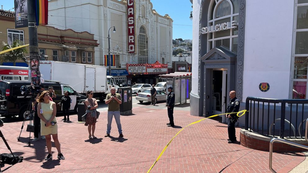 FILE - Police tape blocks the entrance to the Castro Muni Metro train station following a shooting in San Francisco on June 22, 2022. A man who shot and killed a passenger on a San Francisco subway commuter train will be charged with gun crimes but n