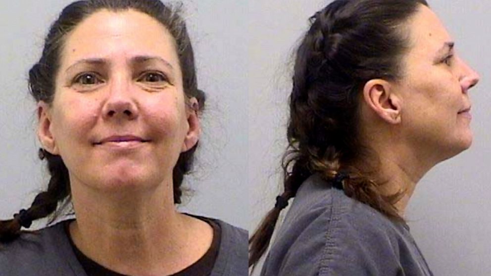 FILE - This undated booking photo provided by the Douglas County Sheriff's Office, in Colorado, shows Cynthia Abcug. Abcug, accused of plotting with supporters of QAnon to have her son kidnapped from foster care, pleaded not guilty to second-degree k