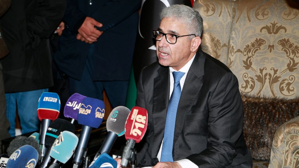 Fathi Bashagha holds a news conference in Tripoli, Libya on Thursday, Feb. 10, 2022. East-based lawmakers named Thursday former Interior Minister Fathi Bashagha to replace Abdul Hamid Dbeibah as head of a new interim government, according to the parl