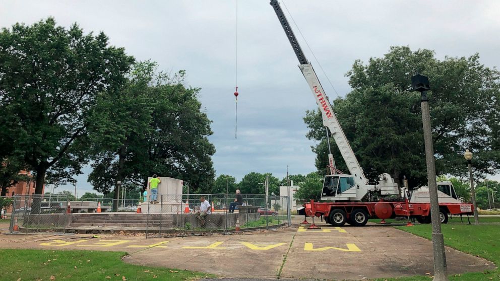 A heavy crane that will be used to help dig up the remains of former Confederate Gen. Nathan Bedford Forrest sits at a park on Tuesday, June 1, 2021, in Memphis, Tenn. The bodies of Forrest and his wife are being moved from the Memphis park, where th