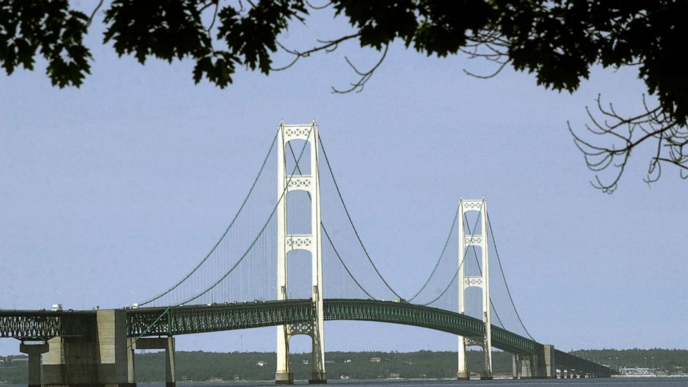 FILE - This July 19, 2002, file photo, shows the Mackinac Bridge that spans the Straits of Mackinac from Mackinaw City, Mich. Michigan's environmental agency said Friday, Jan. 29, 2021, it had approved construction of an underground tunnel to house a