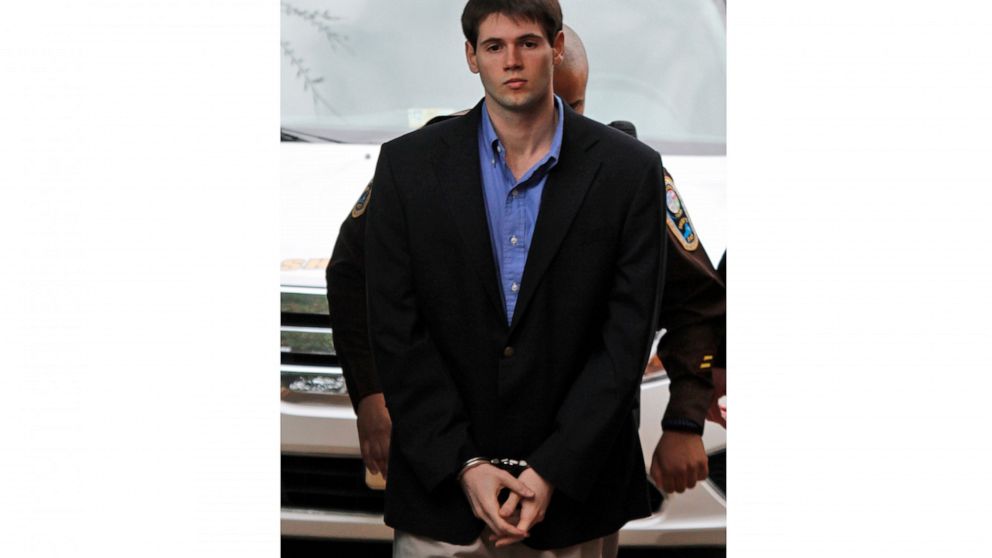 FILE - George Huguely is escorted into the Charlottesville Circuit courthouse in Charlottesville, Va., Wednesday, Feb. 22, 2012. Huguely, who was convicted of second-degree murder in the 2010 killing of a University of Virginia lacrosse player, is he