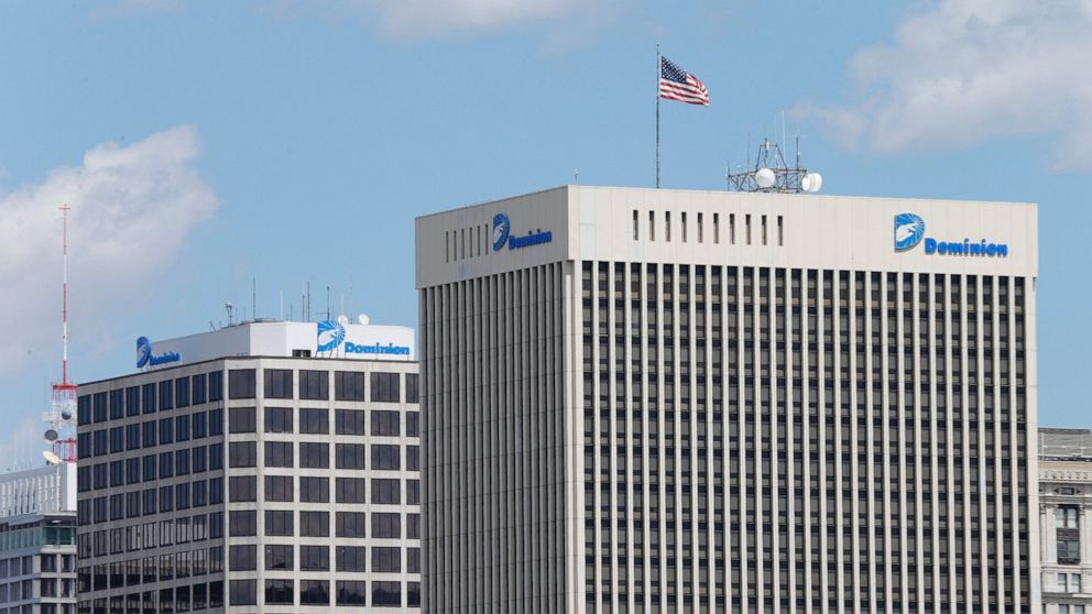 FILE - This April 28, 2015, file photo shows two Dominion Energy buildings in downtown Richmond, Va. The developers of the Atlantic Coast Pipeline announced Sunday, July 5, 2020, that they are canceling the multi-state natural gas project, citing del