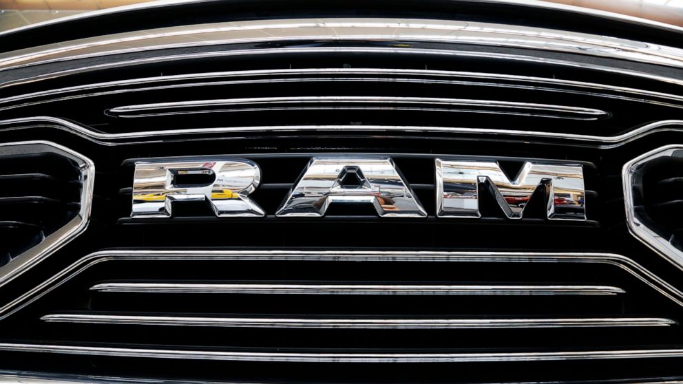 FILE - This is the grill of a 2018 Ram truck on display at the Pittsburgh Auto Show, in a Thursday, Feb. 15, 2018, file photo. U.S. safety regulators are investigating fuel pump failures in more than 600,000 diesel Ram trucks that could cause the eng