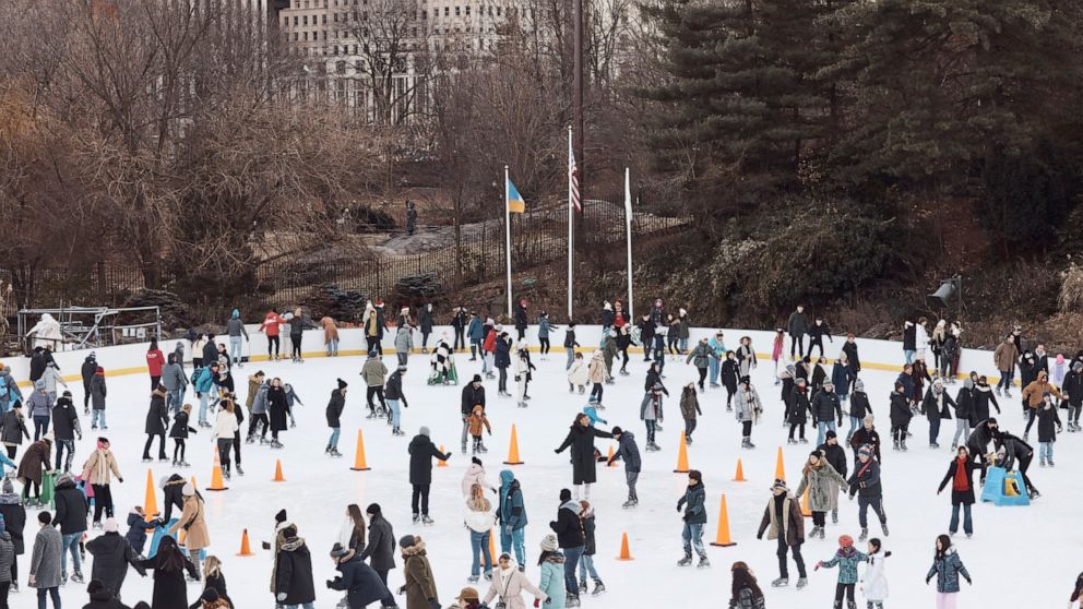 People ice skate on Christmas Day at Central Park on Sunday, Dec. 25, 2022, in New York. (AP Photo/Andres Kudacki)