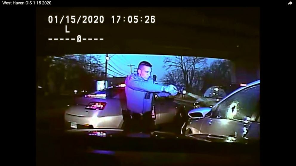 FILE - This Jan. 15, 2020, still image from dashboard camera video released by the Connecticut State Police shows Trooper Brian North after discharging his weapon and fatally shooting Mubarak Soulemane following a high-speed chase. North was arrested