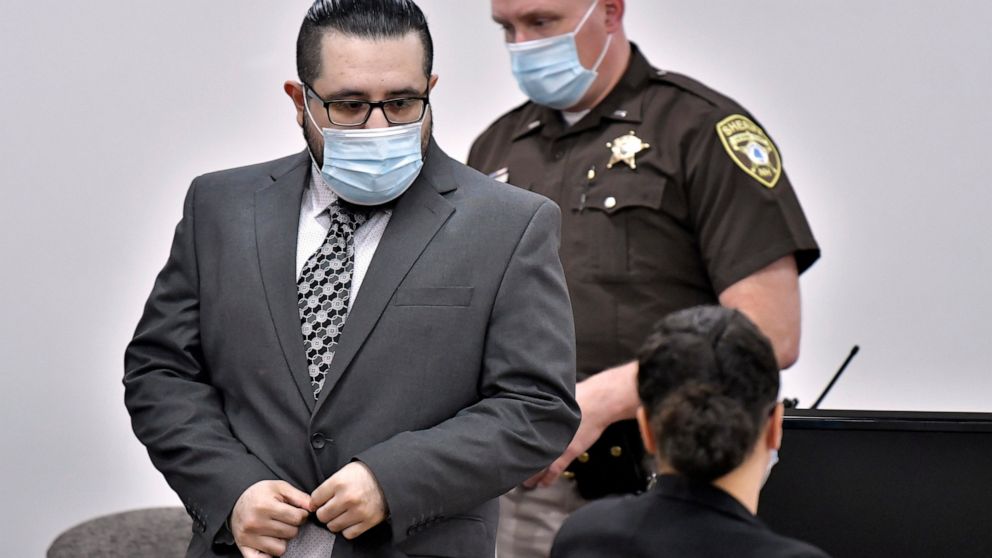 Armando Barron arrives in a courtroom on the first day of his trial at Cheshire County Superior Court, Tuesday May 17, 2022 in Keene, N.H. Barron, who plead not guilty, is on trial on charges of killing his wife's male co-worker after he discovered t