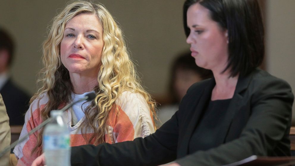 FILE - In this March 6, 2020, file photo, Lori Vallow Daybell glances at the camera during her hearing, with her defense attorney, Edwina Elcox, right, in Rexburg, Idaho. Prosecutors say the mother of two children who were found dead in rural Idaho m