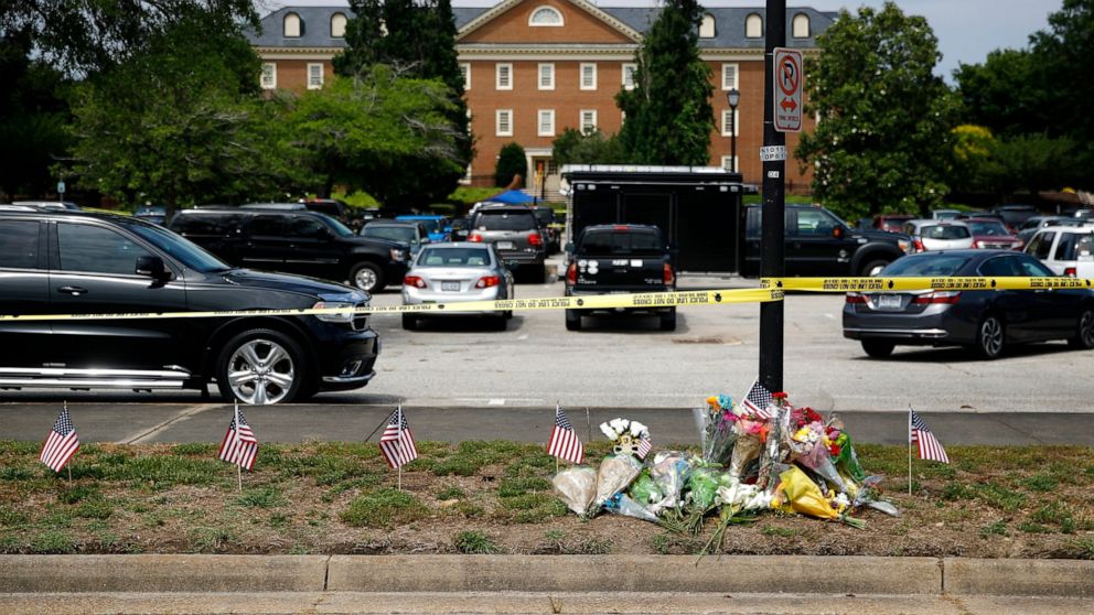 A makeshift memorial rests at the edge of a police cordon in front of a municipal building that was the scene of a shooting, Saturday, June 1, 2019, in Virginia Beach, Va. DeWayne Craddock killed 11 employees and a contractor before engaging in a pro