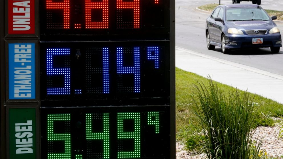 FILE - Gasoline prices are shown at a gas station on June 9, 2022, in Salt Lake City. The average U.S. price of regular-grade gasoline plunged 19 cents over the past two weeks to $4.86 per gallon. Industry analyst Trilby Lundberg of the Lundberg Surv