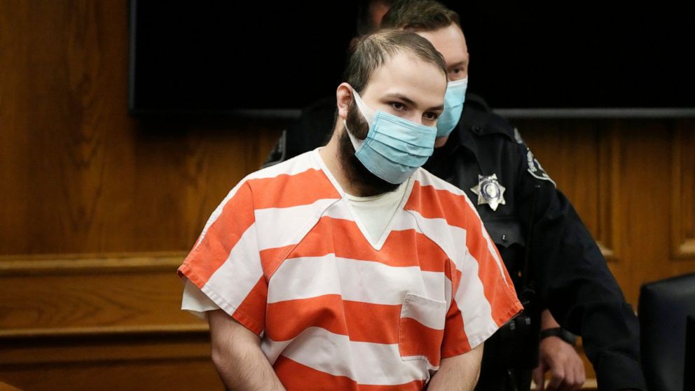 FILE - Ahmad Al Aliwi Alissa, the man accused of killing multiple people at a Colorado supermarket in March 2021, is led into a courtroom for a hearing, Sept. 7, 2021, in Boulder, Colo. A judge ruled Friday, April 15, 2022, that Alissa, charged with 
