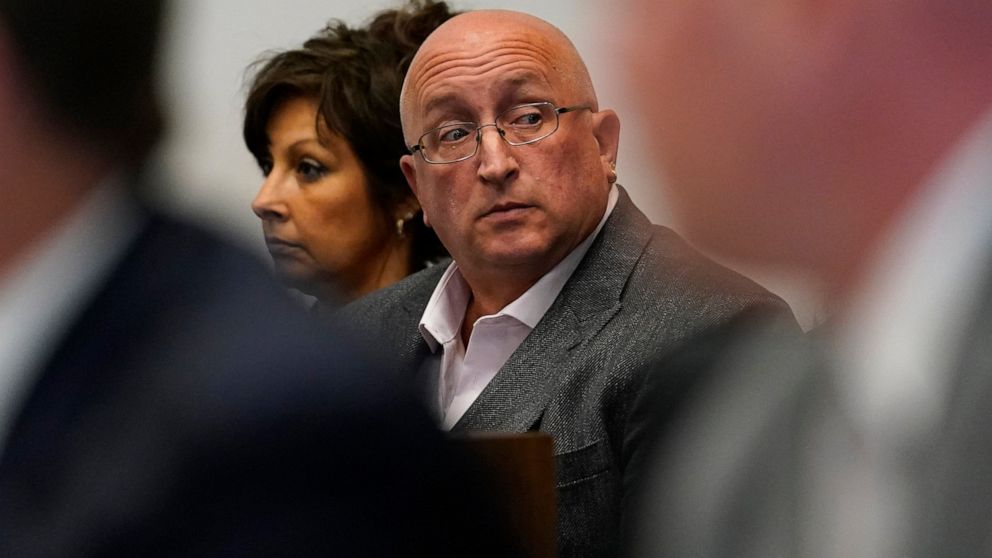 FILE - Robert E. Crimo III's father Robert Crimo Jr., right, and mother Denise Pesina attend to a hearing for their son in Lake County court on Aug. 3, 2022, in Waukegan, Ill. Prosecutors announced Friday, Dec. 16, that Crimo Jr., the father of the I