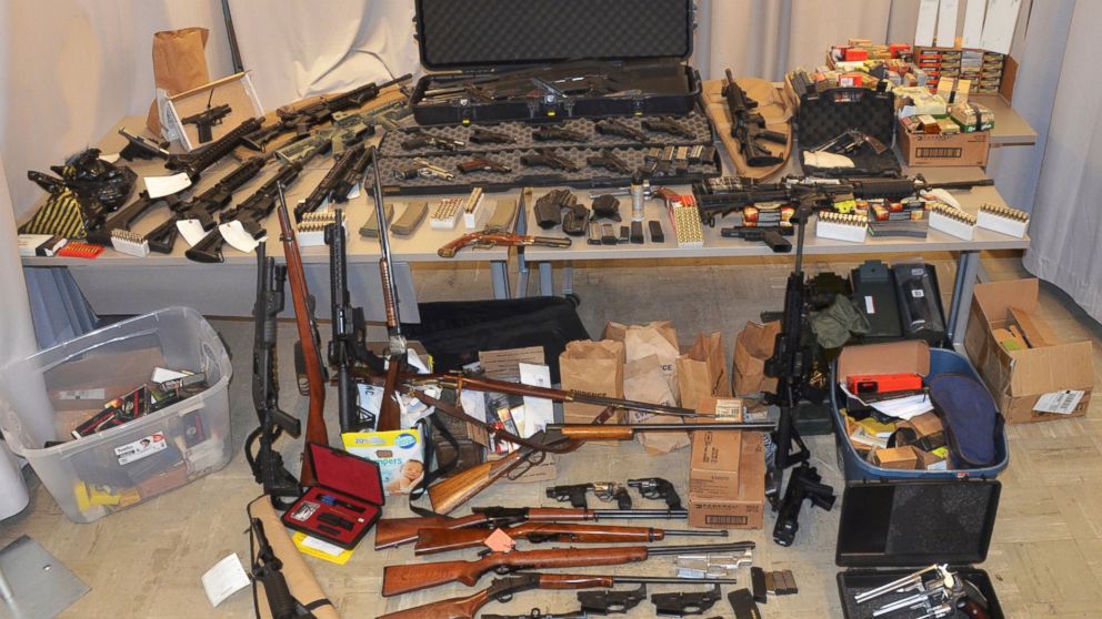 In this March 1, 2019 photo provided by the New York State Police in Middletown, N.Y., a cache of illegally manufactured handguns and assault rifles confiscated from New York City Department of Environmental Protection Police Sergeant Gregg Marinelli