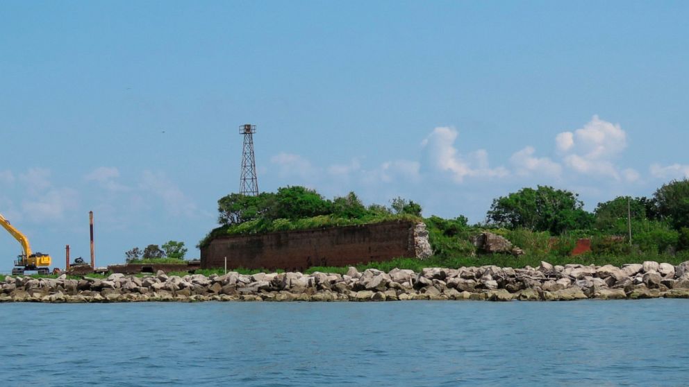  Heavy equipment, dredge rebuild Louisiana barrier island