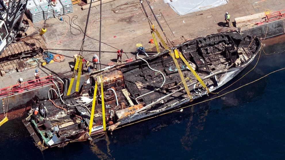 FILE - The burned hull of the dive boat Conception is brought to the surface by a salvage team off Santa Cruz Island, Calif., Sept. 12, 2019. The dive boat captain pleaded not guilty Thursday, Nov. 10, 2022, in federal court for a second time to mans