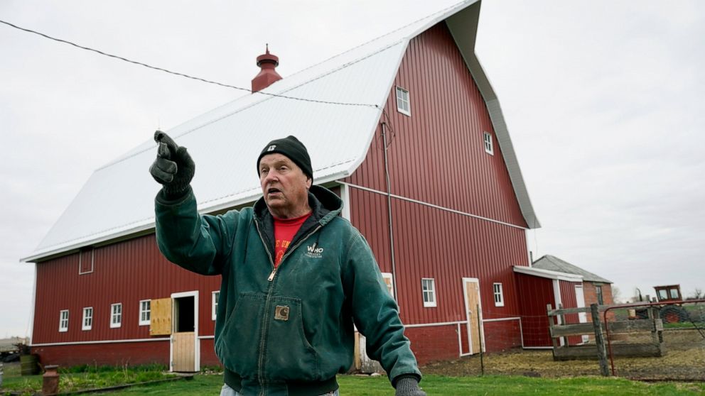 Morey Hill speaks about his farming operation, Friday, April 16, 2021, near Madrid, Iowa. In 45 years of farming, Hill had seen crop-destroying weather, rock-bottom prices, trade fights and surges in government aid, but not until last year had he end