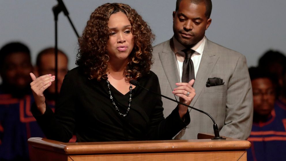 FILE - In this Wednesday, Oct. 23, 2019 file photo, Maryland State Attorney Marilyn Mosby, left, speaks while standing next to her husband, Maryland Assemblyman Nick Mosby, during a viewing service for the late U.S. Rep. Elijah Cummings at Morgan Sta