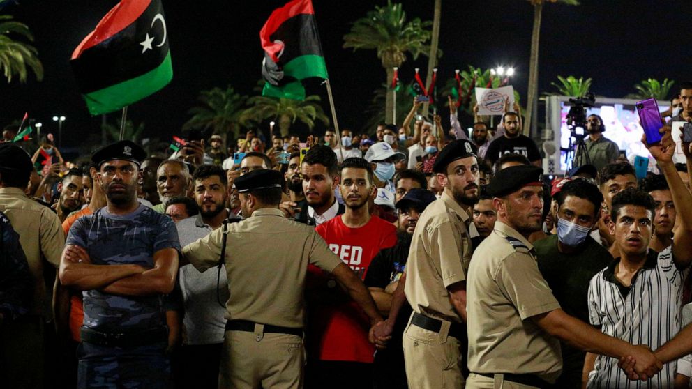 Hundreds of demonstrators protest in Tripoli, Libya, on Friday, Sept. 24, 2021, in opposition to the country’s parliament passing a vote of no-confidence in the transitional government. The motion, passed on Tuesday, represents a challenge to planned