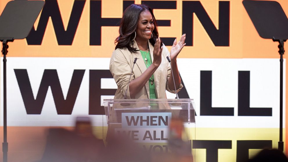 Former first lady Michelle Obama takes the stage during the Culture of Democracy Summit in Los Angeles, Monday, June 13, 2022. (AP Photo/Jae C. Hong)