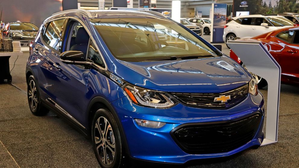 FILE - In this Feb. 13, 2020 file photo a 2020 Chevrolet Bolt EV is displayed at the 2020 Pittsburgh International Auto Show in Pittsburgh. The U.S. government’s road safety agency is investigating complaints that the Chevrolet Bolt electric vehicle 