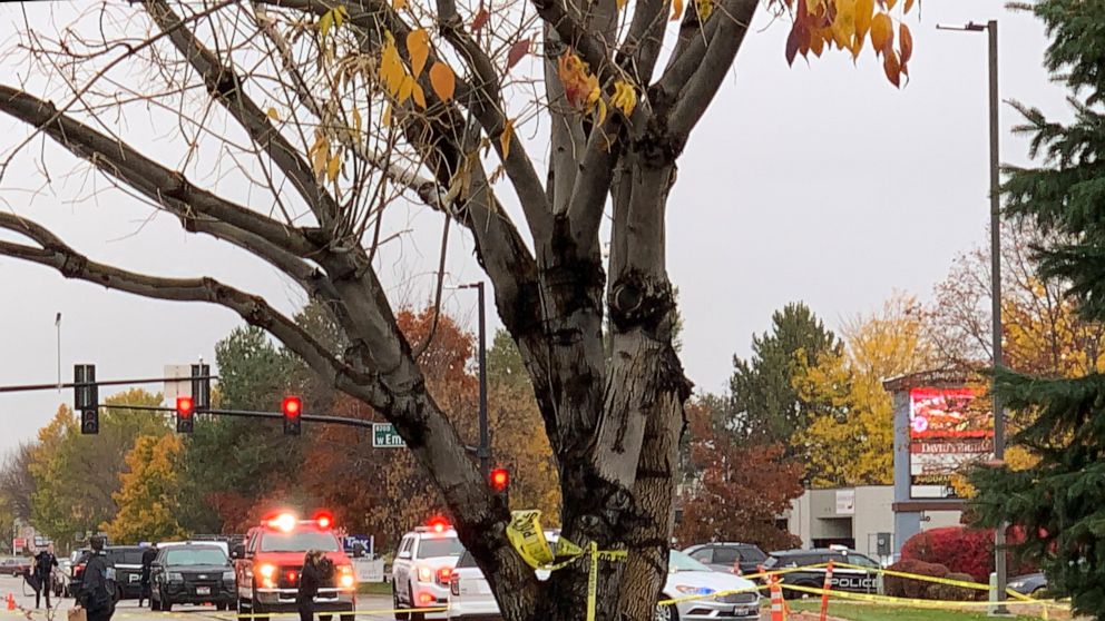 Police close off a street outside a shopping mall after a shooting in Boise, Idaho on Monday, Oct. 25, 2021. Police said there are reports of multiple injuries and one person is in custody. (AP Photo/Rebecca Boone)