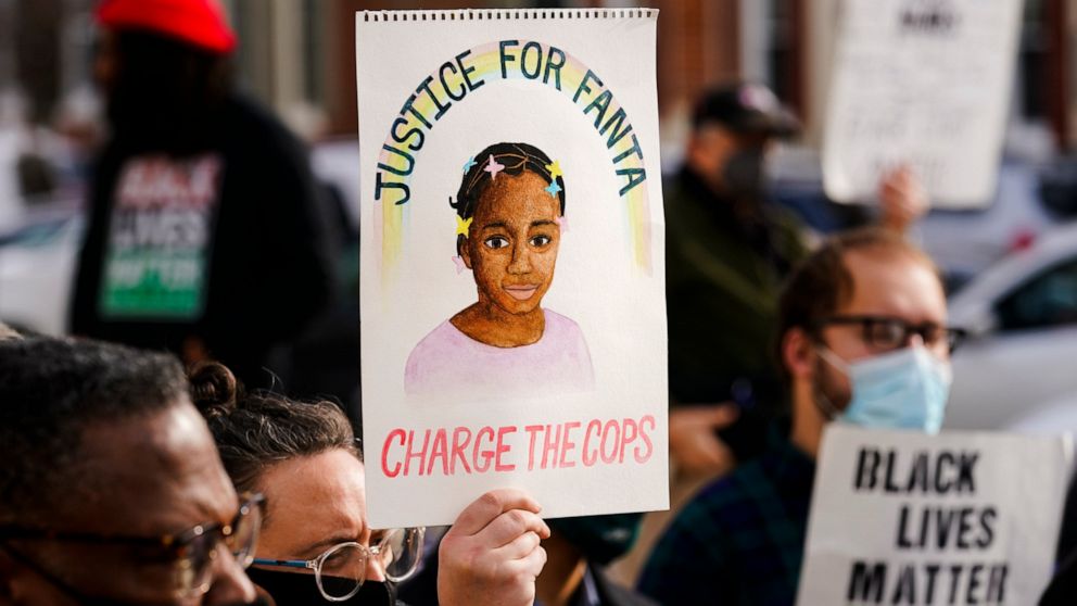FILE - Protesters call for police accountability in the death of 8-year-old Fanta Bility, who was shot outside a football game, at the Delaware County Courthouse in Media, Pa., on Jan. 13, 2022. Three former police officers, who had been charged in t