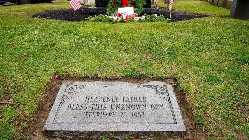 The gravesite of a small boy whose battered body body was found abandoned in a cardboard box decades ago is seen in Philadelphia, Wednesday, Dec. 7, 2022. Nearly 66 years after the boy was found, Philadelphia police are set to reveal the identity of 