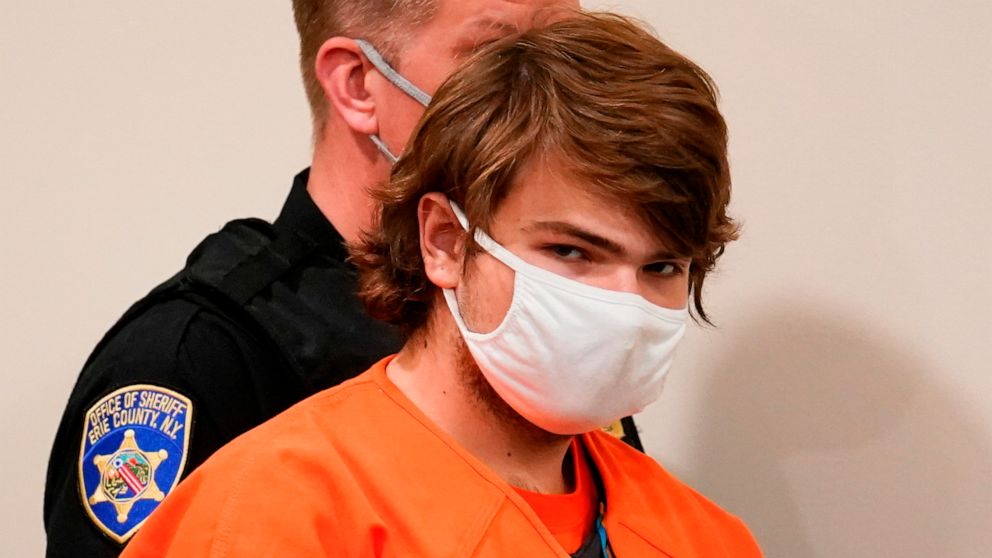 FILE - Payton Gendron is led into the courtroom for a hearing at Erie County Court, in Buffalo, N.Y., Thursday, May 19, 2022. Gendron, who massacred 10 Black shoppers and workers at a Buffalo supermarket, has pleaded guilty to murder and hate-motivat