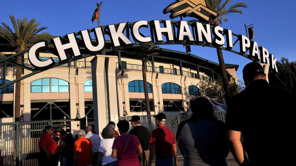 FILE - In this Sept. 18, 2015, file photo, fans arrive at Chukchansi Park in Fresno, Calif., for a minor-league baseball game between the Fresno Grizzlies and the Round Rock Express. Fresno authorities say a man died shortly after competing in a taco