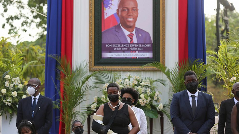 FILE - First Lady Martine Moise, center, attends a memorial service for her late husband President Jovenel Moise, at the National Pantheon Museum, in Port-au-Prince Haiti, July 21, 2021. Rodolphe Jaar, a businessman with dual Haitian and Chilean nati
