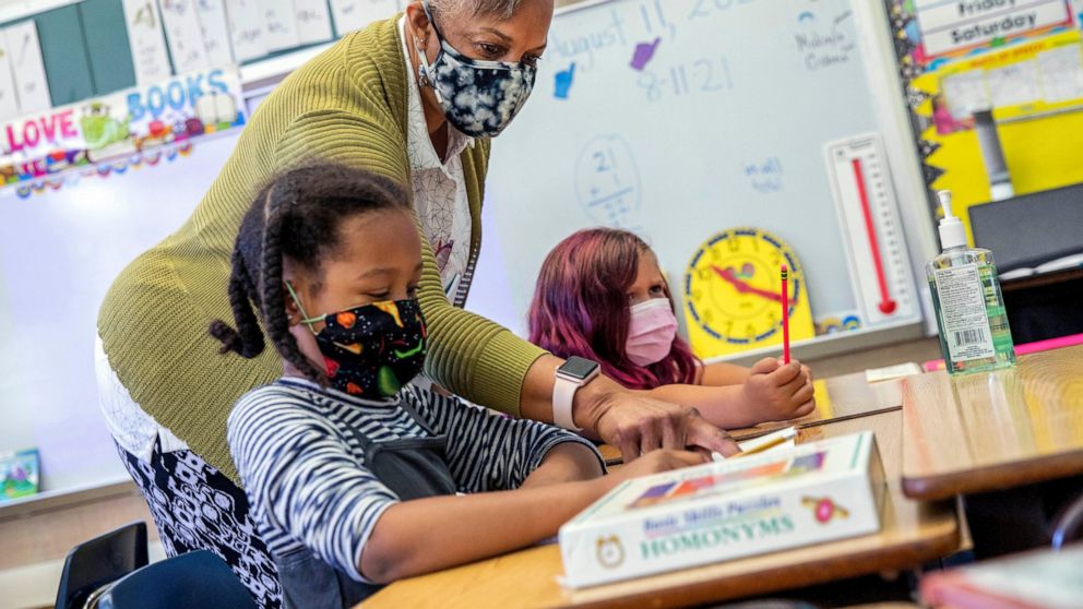 FILE — Joy Harrison instructs her second graders at Carl B. Munck Elementary School, in Oakland, Calif,, Aug. 11, 2021. Oakland is closing seven schools. (Santiago Mejia/San Francisco Chronicle via AP, Pool, File)